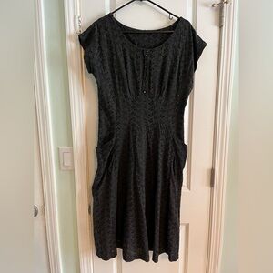 Black eyelet zip up dress. Size 12 with pockets!